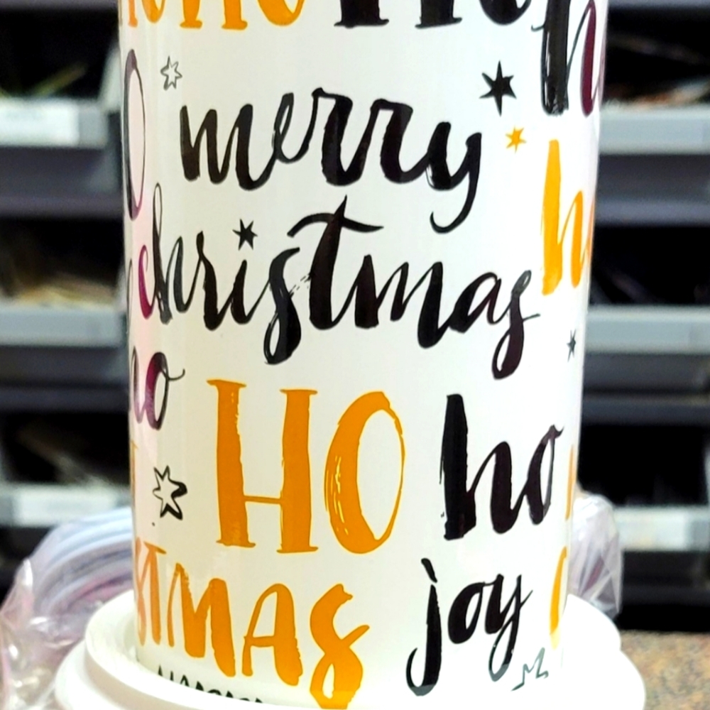 Pink Zebra Ho Ho Ho Simmer light with gold base.